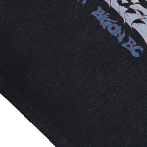 Dragon print sleeveless t-shirt 80s surfer vest retro monster cartoon tank top in acid wash black