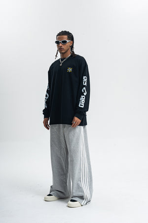 Discard slogan jumper long sleeve grunge t-shirt thunder print top in black