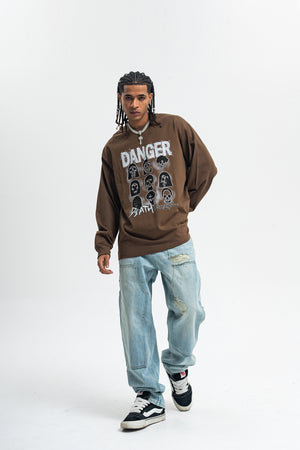 Danger slogan jumper skull print top 90s gothic poster long sleeve t-shirt in brown