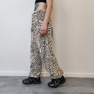 Faux fur zebra joggers animal print pants handmade stripe fleece raver trousers premium party overalls in zigzag festival pants brown white