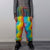 Rainbow faux fur joggers raver pants fluffy psychedelic trousers ski fleece unicorn overalls festival bottoms burning man pants in orange