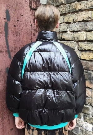 Asymmetric bomber unusual quilted puffer jacket in black