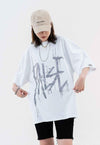 Paint splatter print t-shirt false slogan retro tee in white