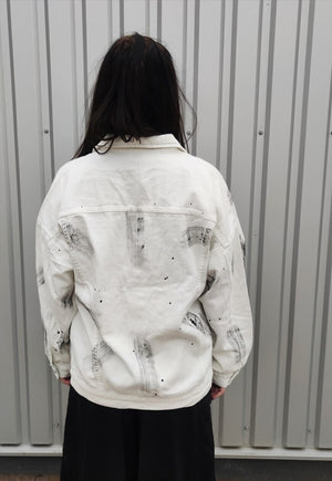 Dirty wash denim jacket paint splatter jean coat in white