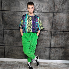 Load image into Gallery viewer, Neon fleece joggers luminous detachable pants handmade fluorescent faux fur raver shorts premium festival overalls in electric techno green