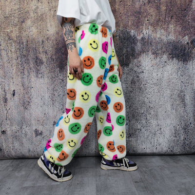 Festival fleece joggers luminous emoji pants handmade fluorescent faux fur raver trousers premium party overalls in rainbow smiley pattern