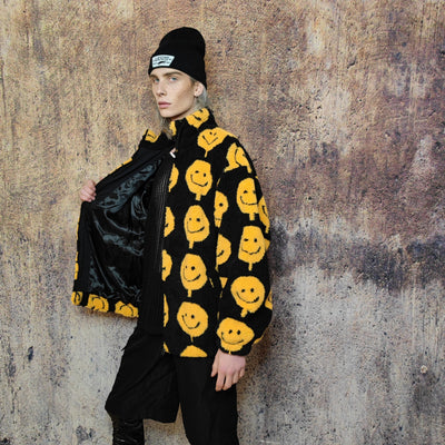 Emoji print fleece jacket fluffy smile bomber festival varsity raised neck cartoon track jacket grunge geometric coat in black yellow